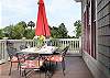 Outdoor dining area and gas grill