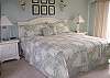 Master bedroom features king bed, open deck and private bath