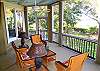 Take in the views and marsh breezes from this large screened in porch.