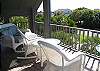 Enjoy sea breezes and partial ocean views from the deck