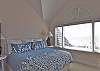 The upstairs oceanfront king bedroom suite with TV and private bath