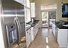 Gourmet kitchen with Kitchen Aid stainless appliances