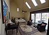 Located on the first floor this large suite has a king bed, sitting area, lagoon views and private bath