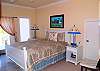 Located upstairs with queen bed, TV, open deck and full bathroom with tub/shower
