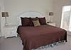 Enjoy a large bedroom with private bath and access to the deck