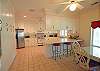 The kitchen is quite large and has an eat in area and desk area where you can set up your computer.