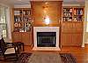 Enjoy custom built ins around the gas fireplace