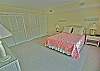 Located on the lower level of the home, shares a bath with the twin bedroom