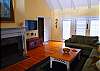 Enjoy comfortable seating and vaulted ceiling with ceiling fan