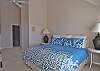The upstairs king bedroom suite