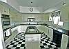The kitchen has been recently renovated and offers stainless appliances and granite counter tops