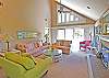 Lots of comfortable seating, great light! Vaulted ceiling with ceiling fan