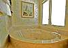 Deep soaking tub in the master bath