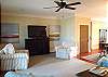 Plenty of seating and a large flat screen TV to enjoy