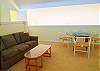 Sleeper sofa and game table.  Master bedroom is to the left.  Bathroom is to the right