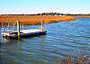 Community dock with floater for easy launch!  Also a great place to fish or crab