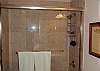 Tile shower/tub combo, access from the bedroom or the hall