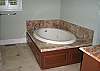 Marble framed Jacuzzi tub