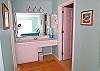 Enjoy two separate vanities in the master bath area. This one is between the full bath and the walk in closet