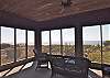 Looking from the master bedroom out to the oceanfront screened porch