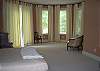 Large master bedroom with sit in area that overlooks the golf course.  Offered unfurnished.