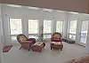 Relax with a good book in the sunroom