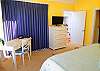 Furnished with a king bed, located on the upper level, deck access, flat screen TV and private bath with tub/shower