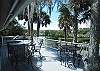 Large deck with plenty of furnishings and lagoon views