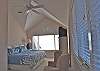 The large king suite upstairs has vaulted ceilings and fabulous ocean views