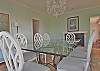 Freshly painted for 2013, the dining room has large picture windows overlooking the ocean. Screened porch just off the dining room