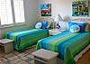 Located on the first floor with twin beds and a private bath with tub/shower