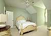 Upstairs queen bedroom shares bath