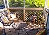Cozy screened porch off the dining room