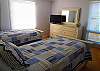 Two new twin beds, flat screen TV and full bath.  Located on the main level of the villa
