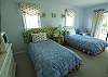 Twin bedroom with full bath and deck access located on the first floor