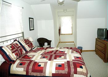Queen Bedroom on the upper level.