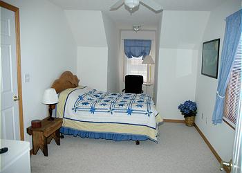 Queen Bedroom on the upper level.