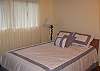 Bedrooms are simple and clean with nice bedding, dressers and bedside lighting for reading.