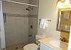 Newly remodeled bath - ceramic tile walk- in shower.
