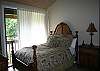 Queen size bed with window a/c unit.  All furniture is new.