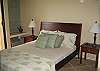 Queen size bed, window a/c, ceiling fan.