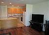 Upgraded kitchen cabinets, appliances and ceramic tile counter tops.