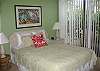 Queen size bed, window a/c, ceiling fan.