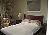 Queen size bed, window a/c, ceiling fan, flat screen TV.