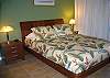 Queen size bed, ceiling fan, flat screen TV.
Hair dryer and beach towels.