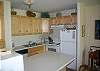 New maple kitchen cabinets and appliances.