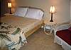 Ceiling fan, bath with separate shower area.  Queen size bed.