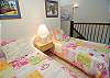 Twin beds, ceiling fan.