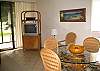 TV and dining area.  Screened in lanai.