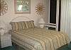 Queen size bed, window a/c, ceiling fan.